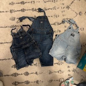 Three pairs of Oshkosh. Two shorts one long pants.